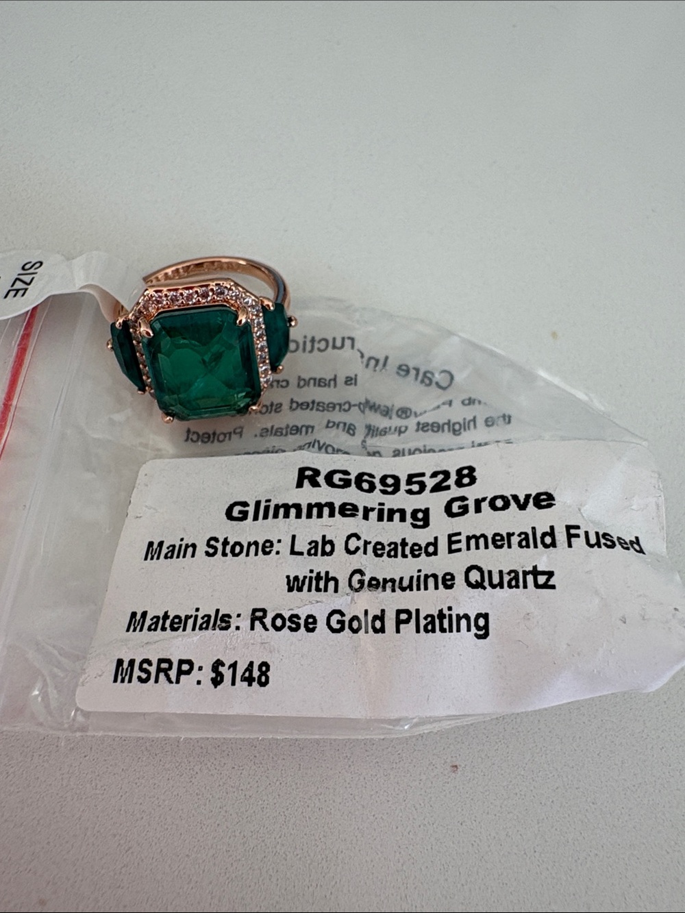 Glimmering Grove Rose Gold-Plated Ring with Emerald Green Stone